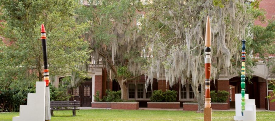 Virgin Bald Cypress trees, acrylic paint, adhesives, concrete, metal, green Maple, Red Oak, body filler, fiberglass, ceramic clay and glazes. Dimension left to right: Flute is 156” H x 8” Dia Stair is 36 x 20 x 65 inches, Flute is 156” H x 8” Dia Base is 40 inches Dia, Flute is 156” H x 8” Dia Stair is 49” H x 40” Dia.